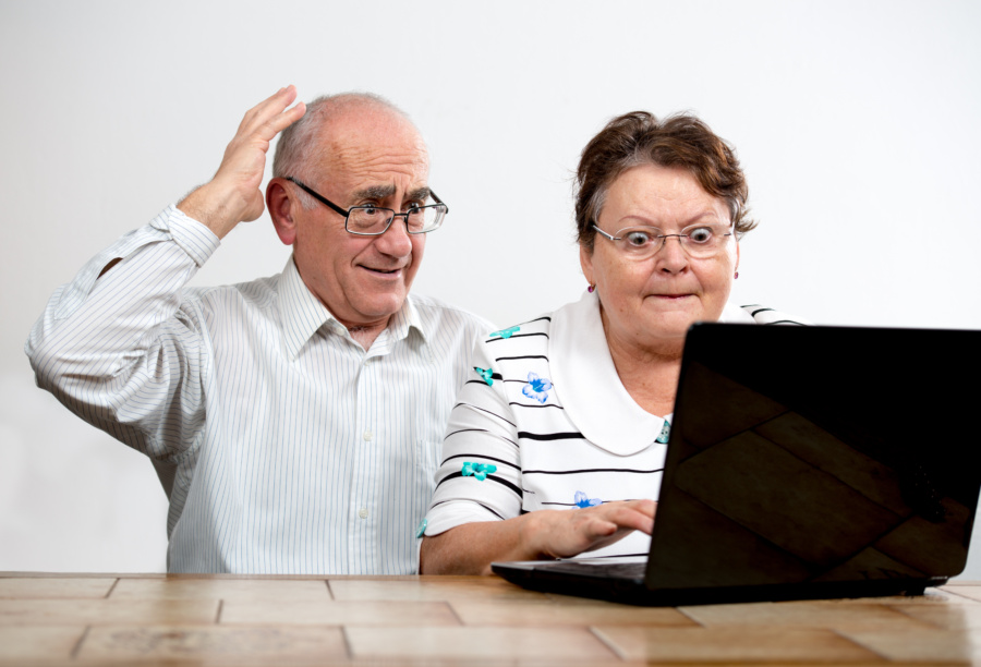 Old Couple With Laptop